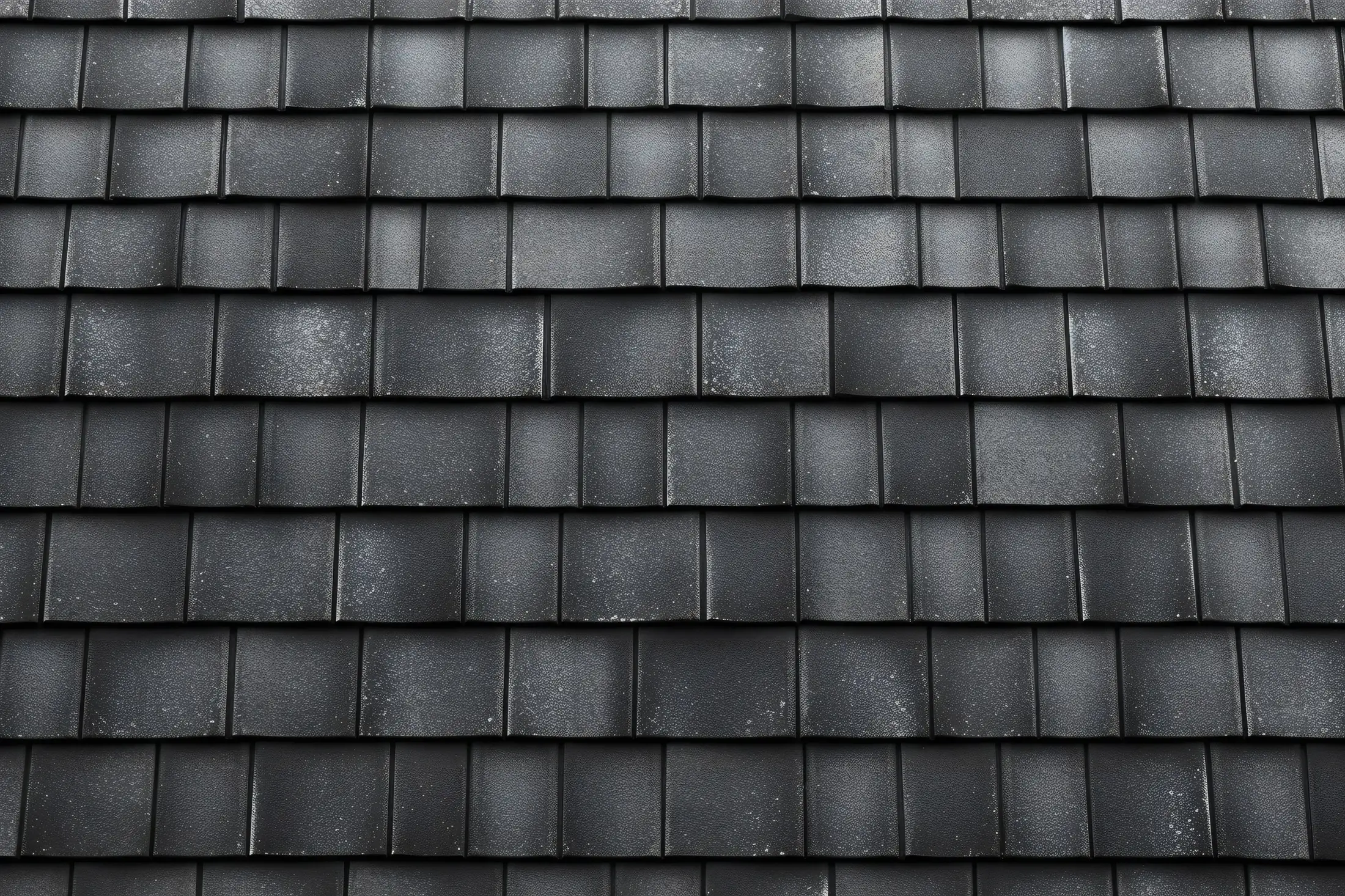 Freshly coated charcoal roof tiles (after)