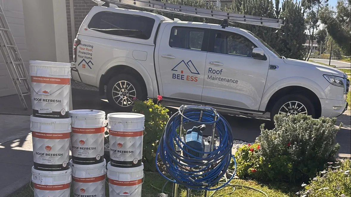The BEE ESS Roof Maintenance ute with Roof Refresh coating buckets and a roof sprayer ready for a job